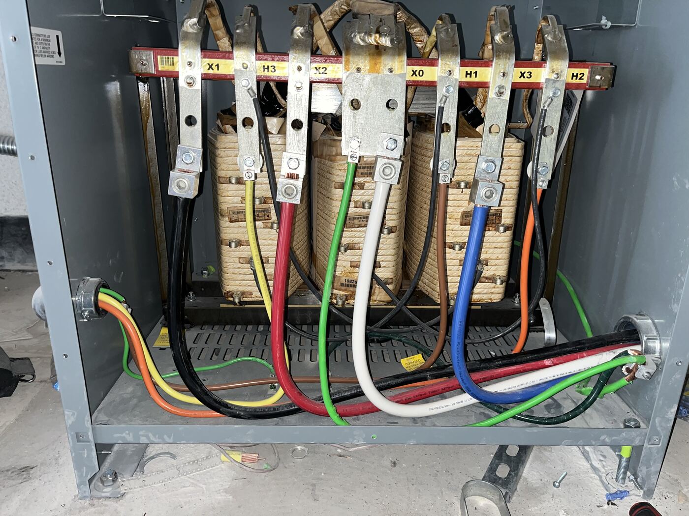 Three-phase dry-type transformer with color-coded feeders